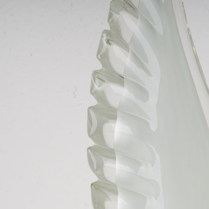 Decorative glass artwork in wing shape