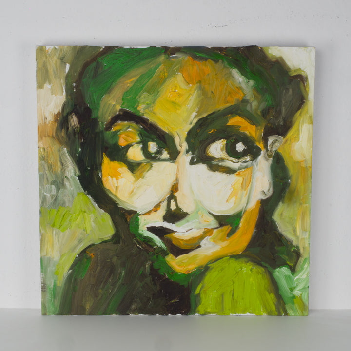 Portrait painting of a woman in green, yellow and orange by artist Hilde Deceuninck