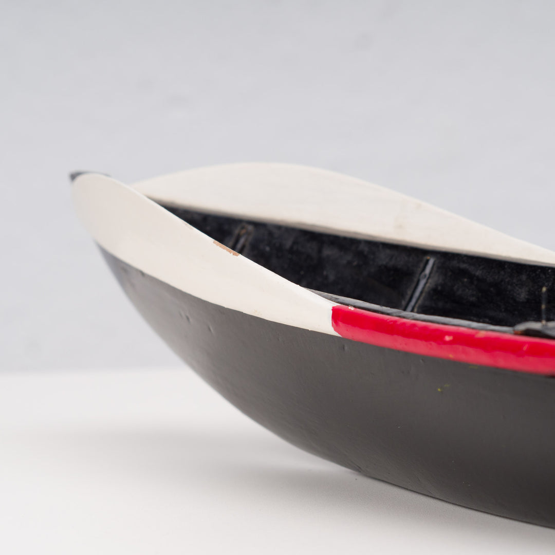 Nice painted wooden boat in red, white and black