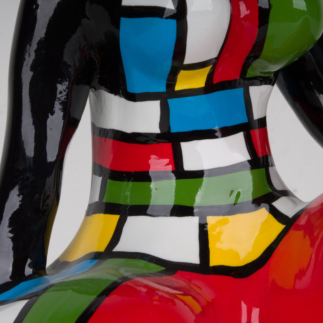 Modern colorful statue of a lady by Déesse