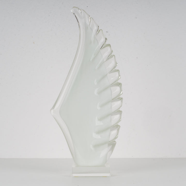 Decorative glass artwork in wing shape