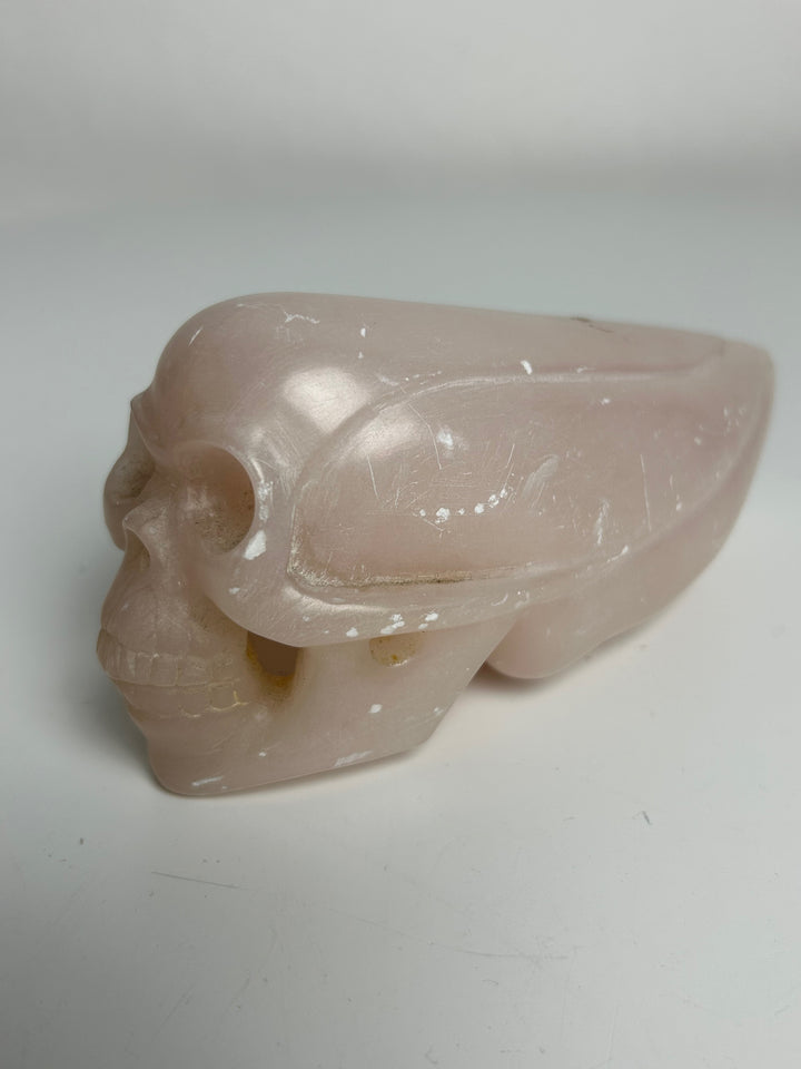 Sculpture – Skull in pink calcite | 15 x 5.5 x 7 cm