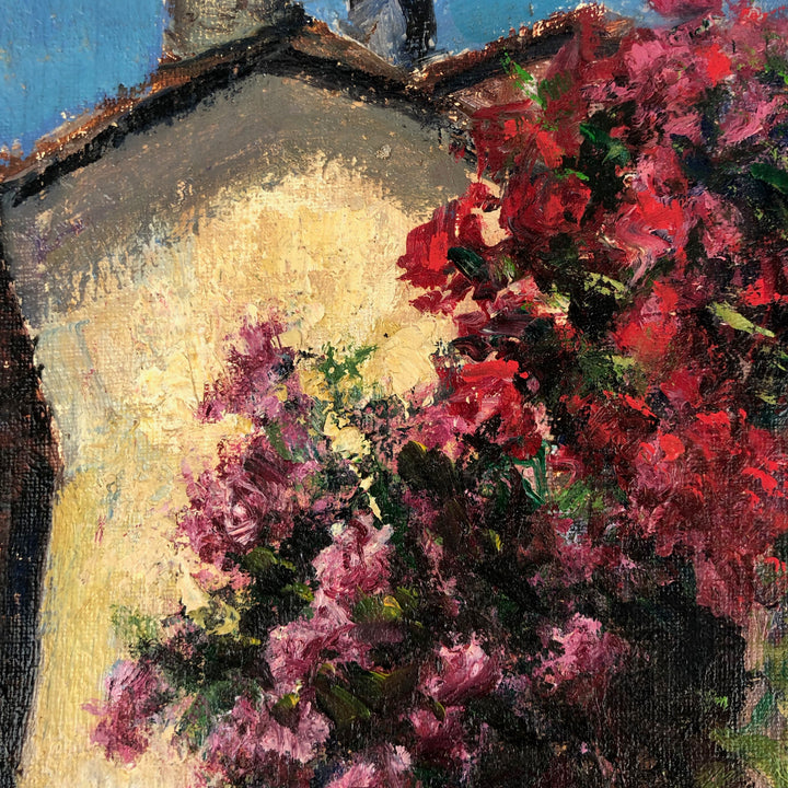 Painting of a Southern village with colorful flowers by Renaat Ivens