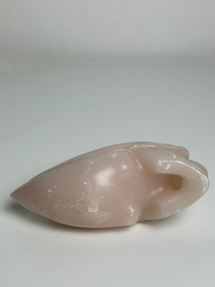Sculpture – Skull in pink calcite | 15 x 5.5 x 7 cm