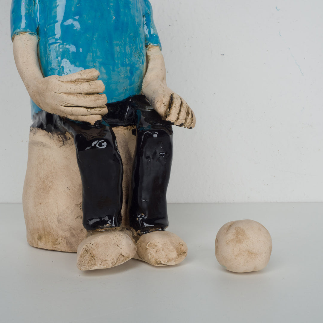 Playful image of a football player in clay