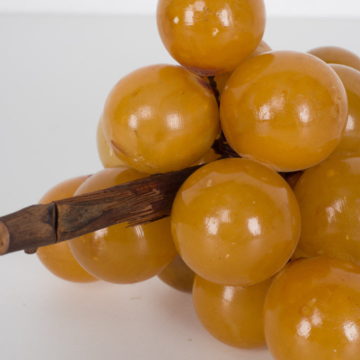 Beautiful shiny grapes in alabaster