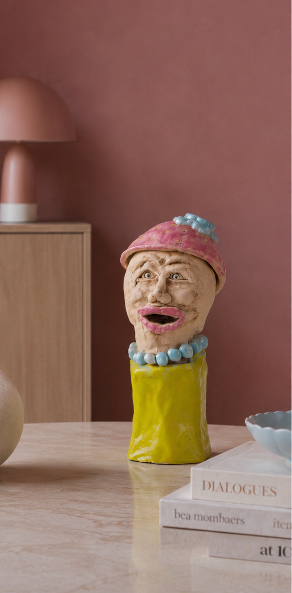Handmade statue of a woman – light green glazed, with social engagement