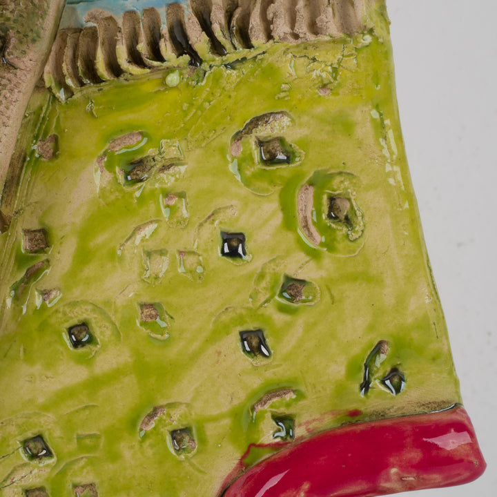 Ludiek geometrisch keramisch beeld – Gezichten in lichtblauw en groentinten