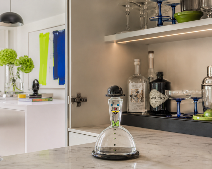 Playful glass carafe with painted man - black and colorful detail