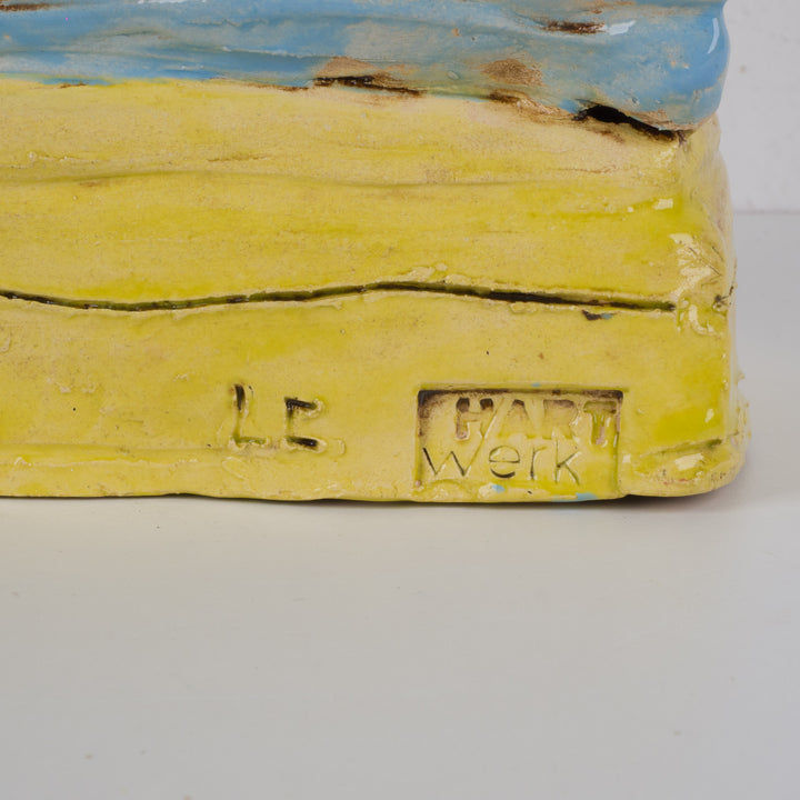 Kleurrijk handgemaakt keramisch beeld – De Reiziger