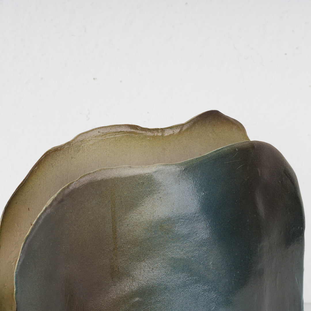 Green glazed ceramic vase in an elegant shape