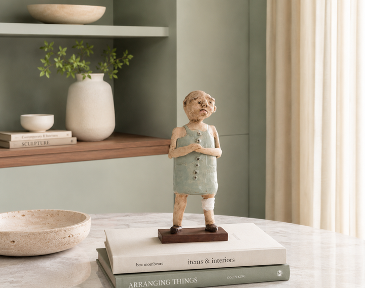 Handmade ceramic statue – Sick man with bandage