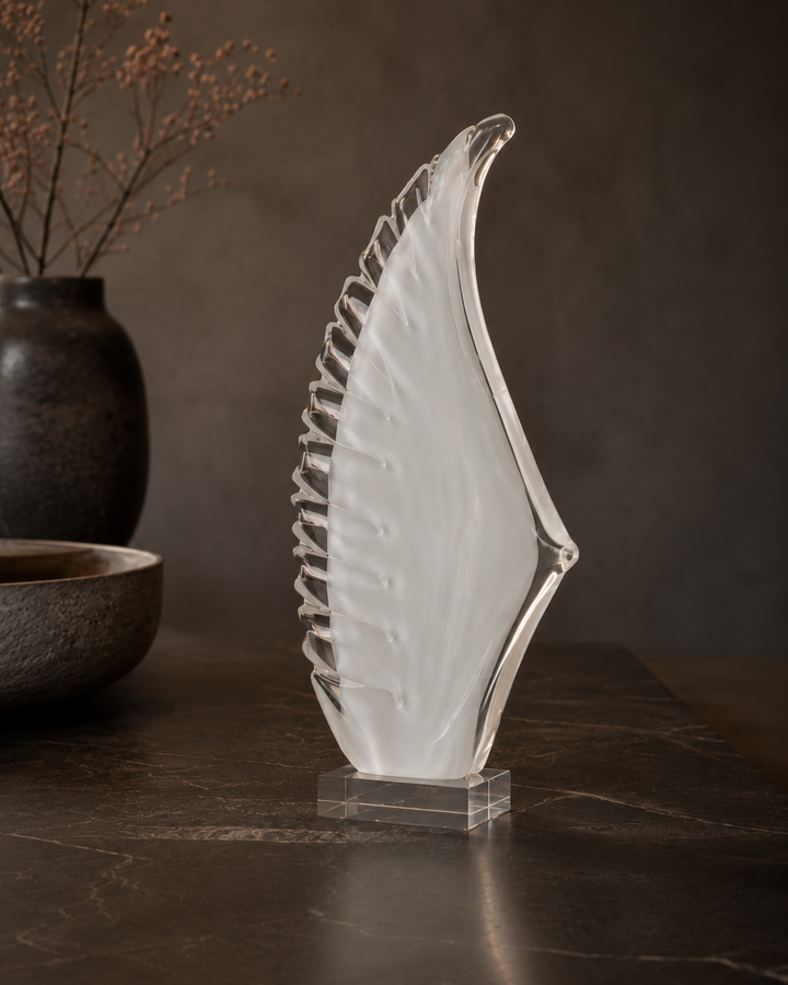 Decorative glass artwork in wing shape