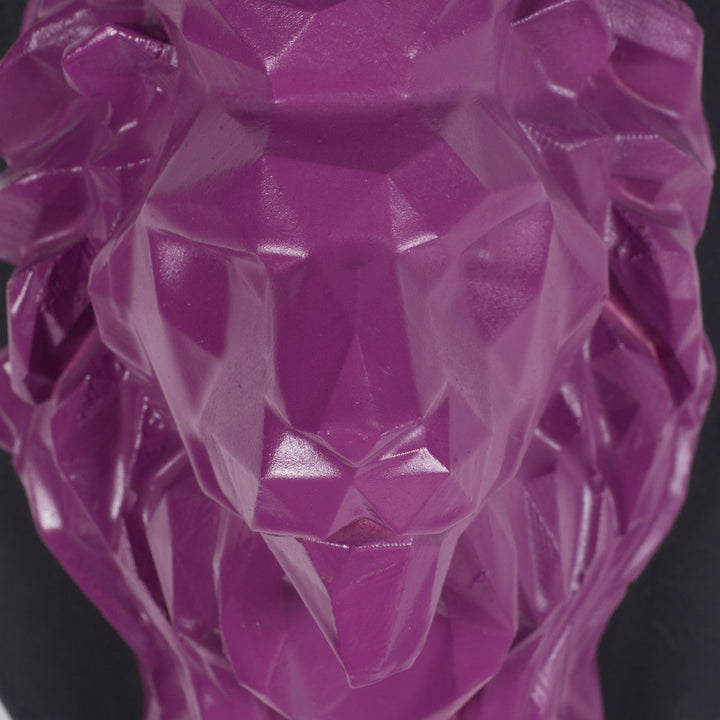 Artwork of a lion head in purple in resin