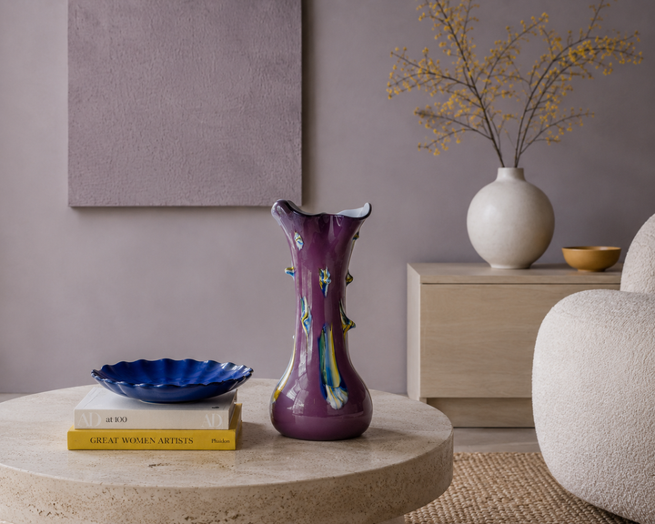 Modern large purple glass vase with studs.