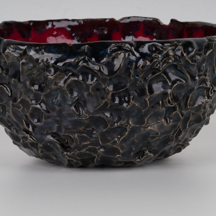 Beautiful black lacquered ceramic bowl with structure